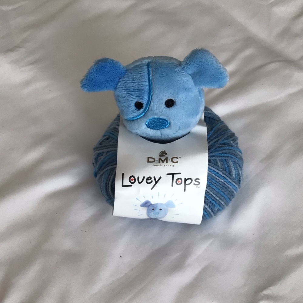 DMC Lovey Tops pacifier clip and yarn blanket kit puppy plush pattern inside